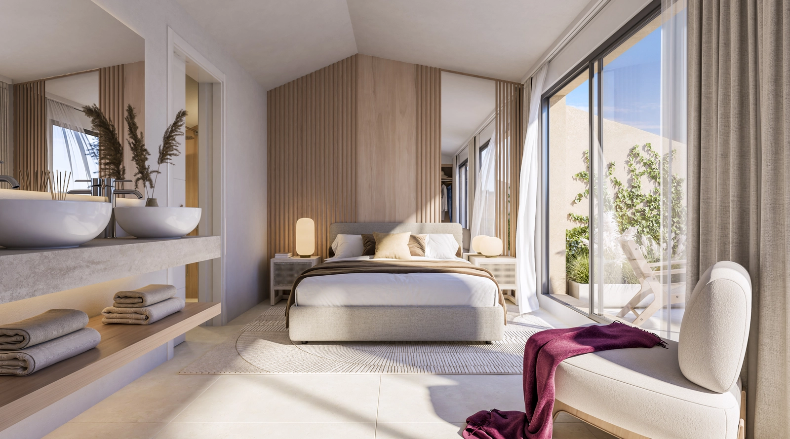 La suite principal, un refugio tranquilo con un baño de planta abierta y acceso directo a una terraza privada.