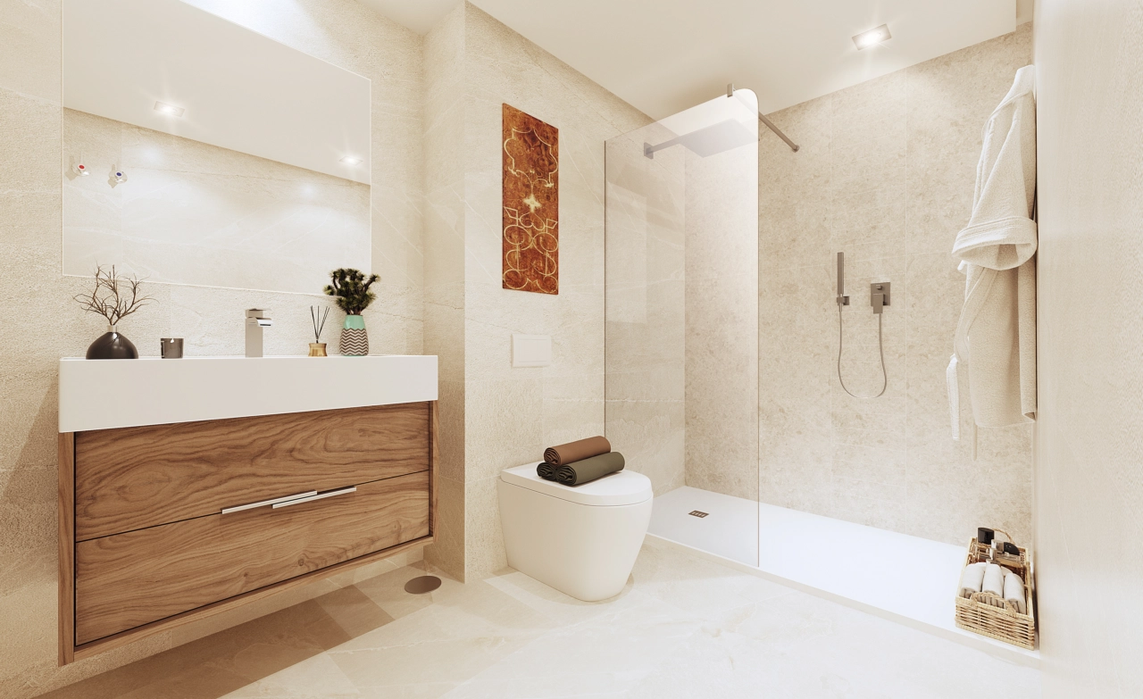 Un elegante baño con ducha a ras de suelo y accesorios contemporáneos en tonos cálidos y naturales.