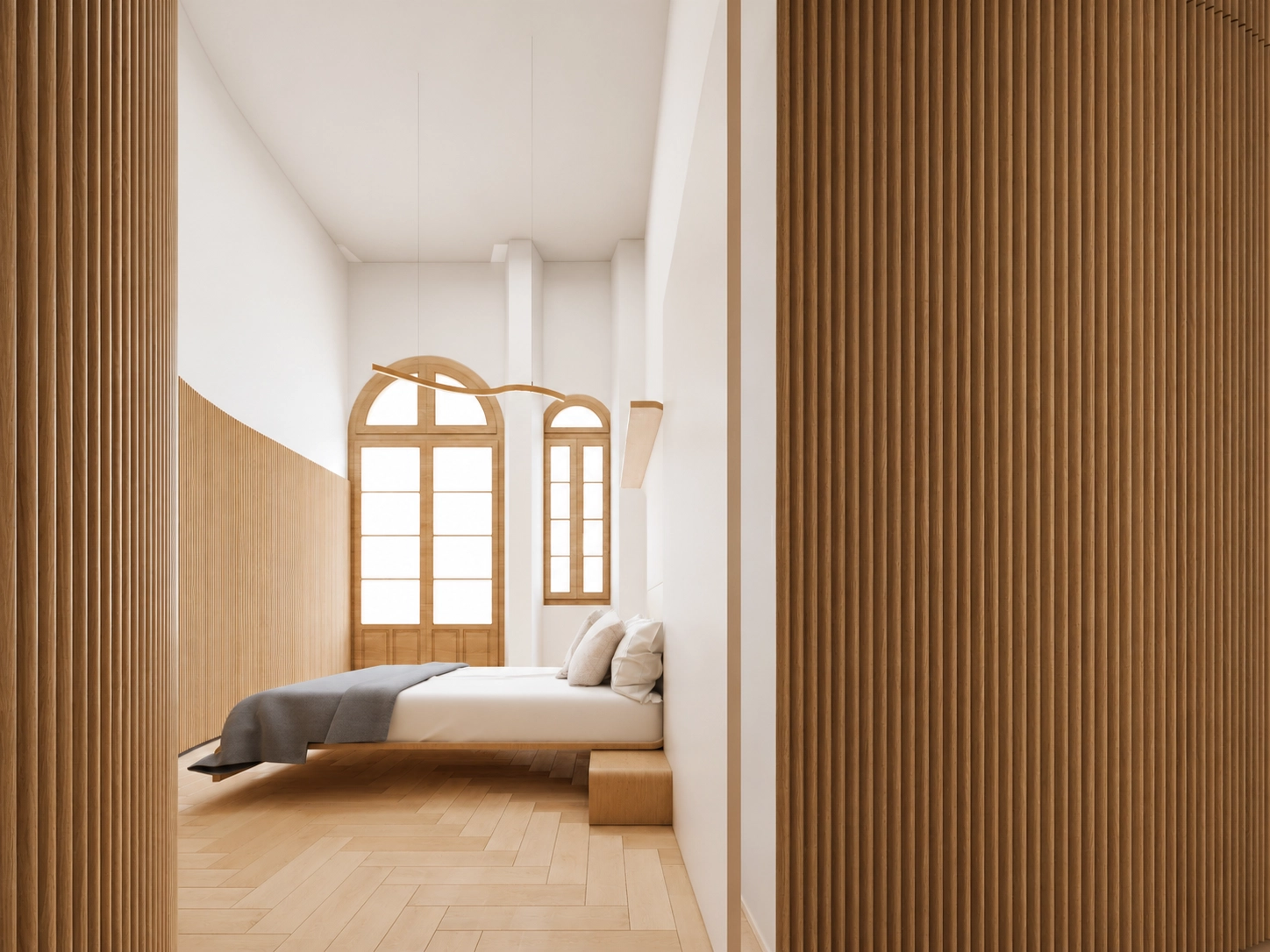 Los dormitorios están diseñados como refugios de paz, con suelos de madera natural y un estilo minimalista.