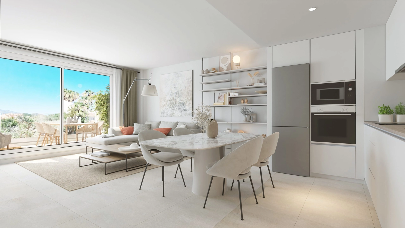 Una sala de estar y comedor de planta abierta, bañada por la luz natural de la terraza.