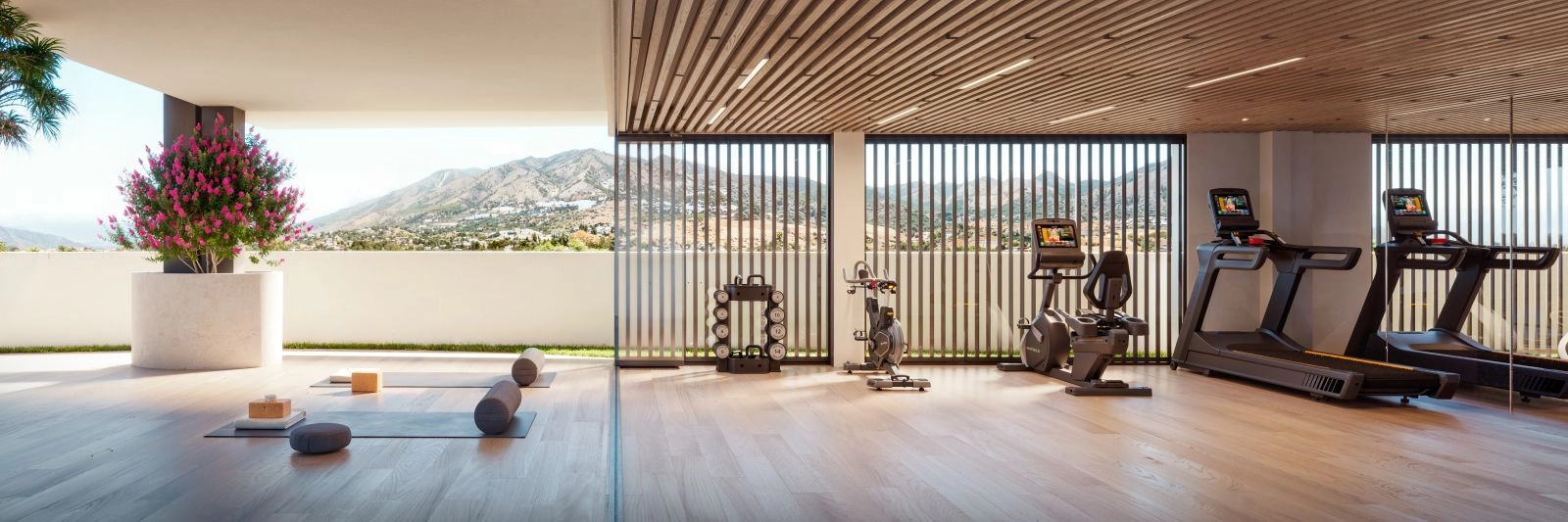 El gimnasio y la zona de bienestar de última generación ofrecen vistas inspiradoras a las montañas.