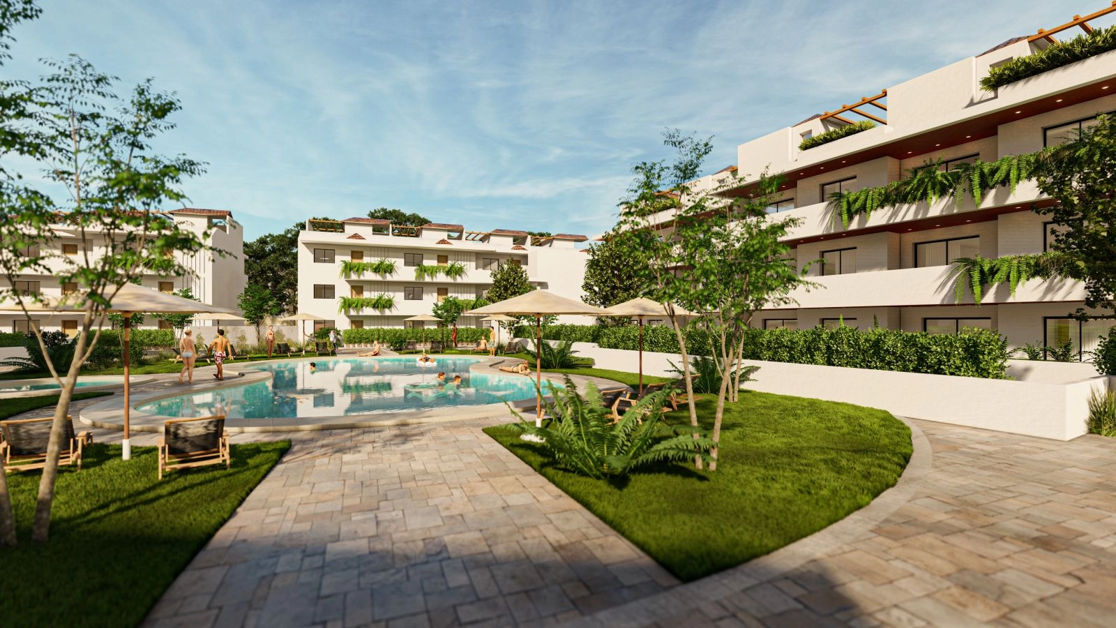 La urbanización cuenta con bonitos jardines comunitarios y una amplia piscina para el disfrute de los residentes.