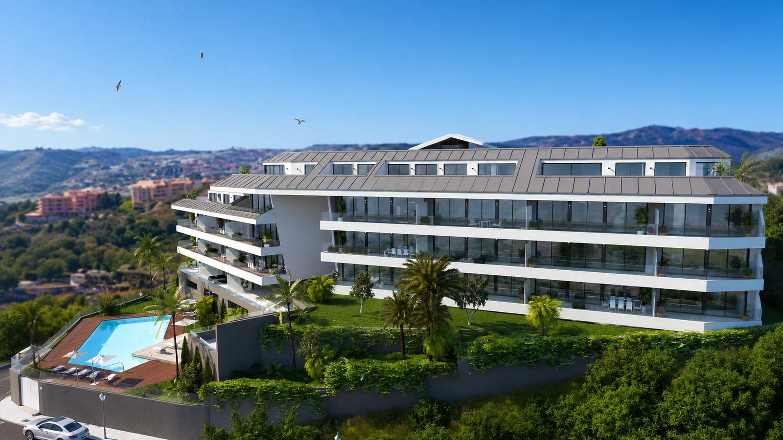 La posición elevada del edificio asegura que los residentes disfruten de impresionantes vistas sobre el paisaje circundante y el mar Mediterráneo.