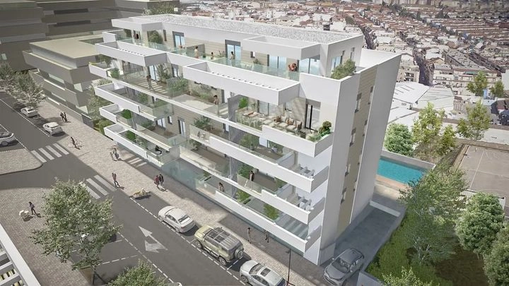 Una vista general de la urbanización, destacando su arquitectura moderna y la zona de piscina comunitaria.