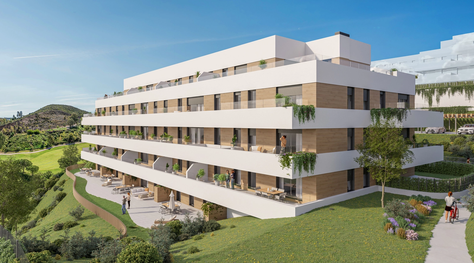 La moderna arquitectura de las residencias, con vistas al exuberante paisaje verde del campo de golf.
