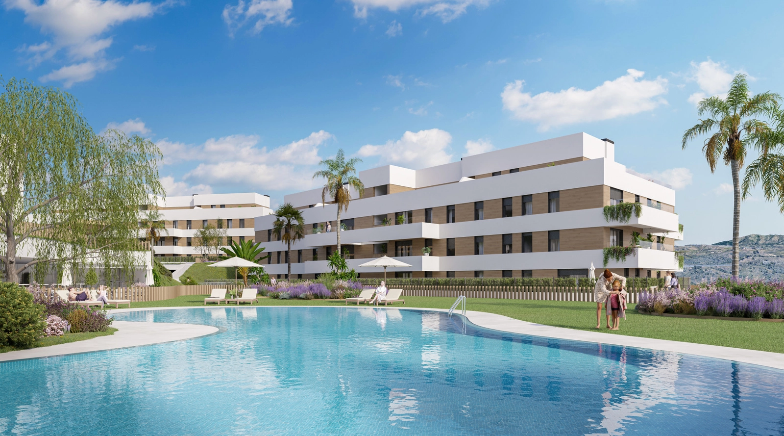 La atractiva piscina comunitaria, rodeada de césped y edificios de apartamentos modernos.
