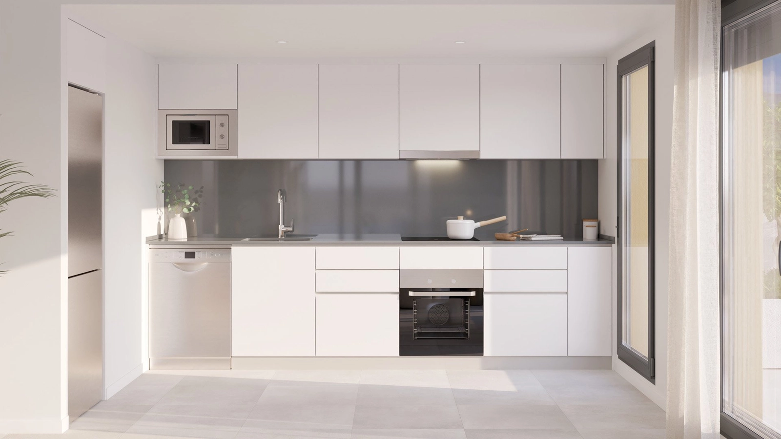 La cocina totalmente equipada presenta un diseño elegante y minimalista con electrodomésticos de alta calidad.