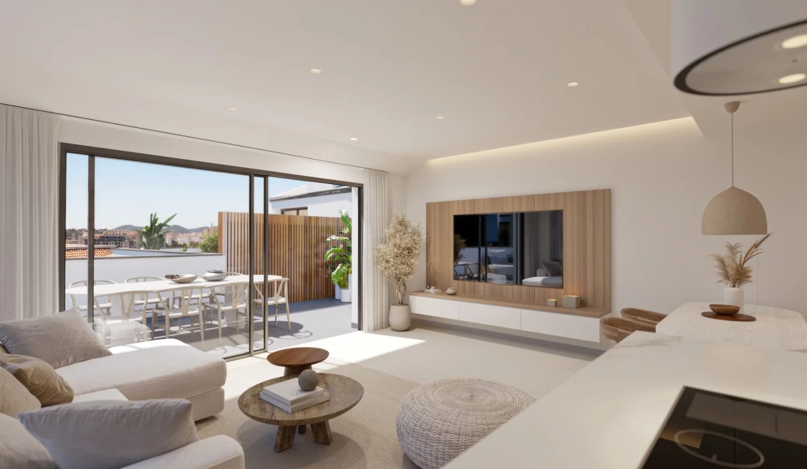 Salones de planta abierta que conectan a la perfección con los espacios exteriores privados.