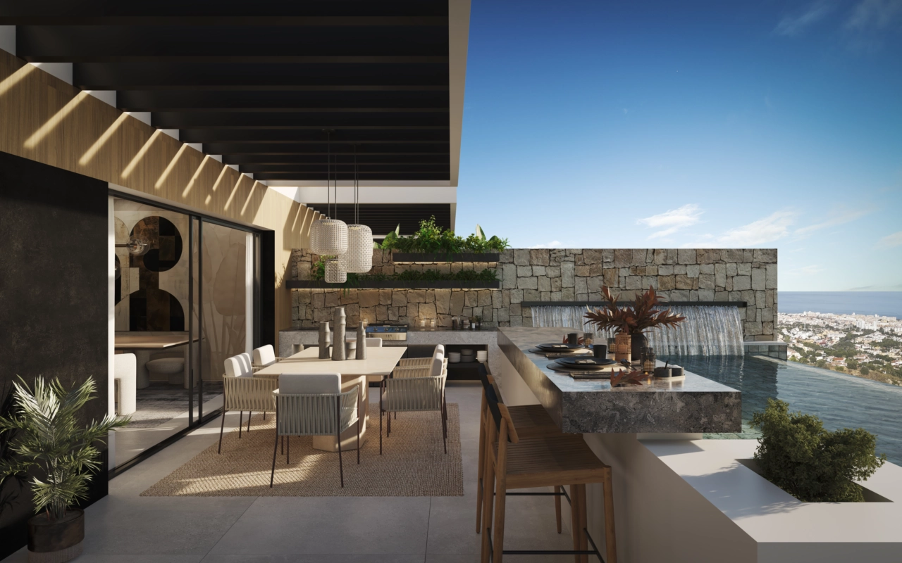 Una cocina y barra exteriores hacen que recibir a amigos y familiares sea un verdadero placer.