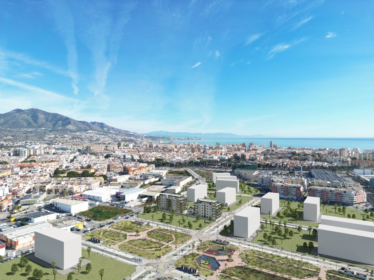 Una vista aérea de la promoción, mostrando su ubicación privilegiada cerca del mar en Fuengirola.