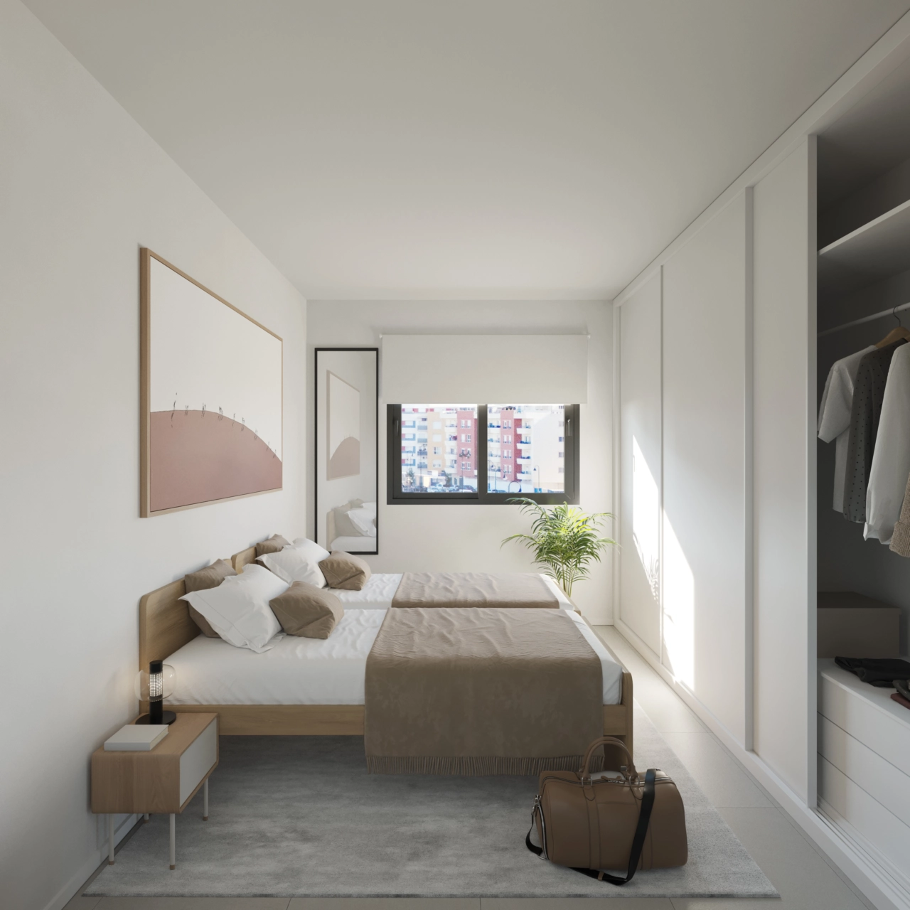 Un cómodo y luminoso dormitorio secundario con amplio espacio de almacenamiento.
