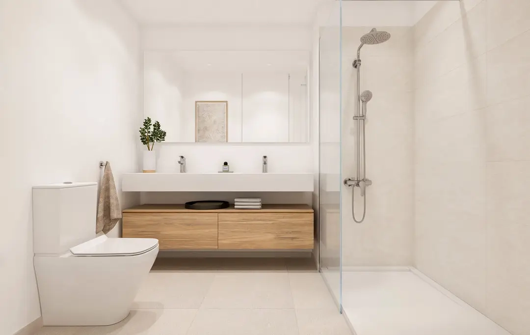 Baños elegantes con materiales de alta calidad y un diseño moderno y funcional.