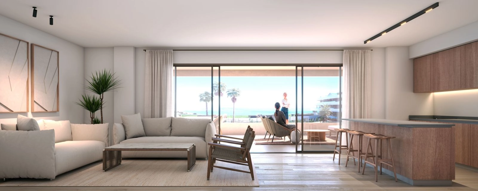 Un salón luminoso y elegante que se abre directamente a una terraza privada con vistas al mar.