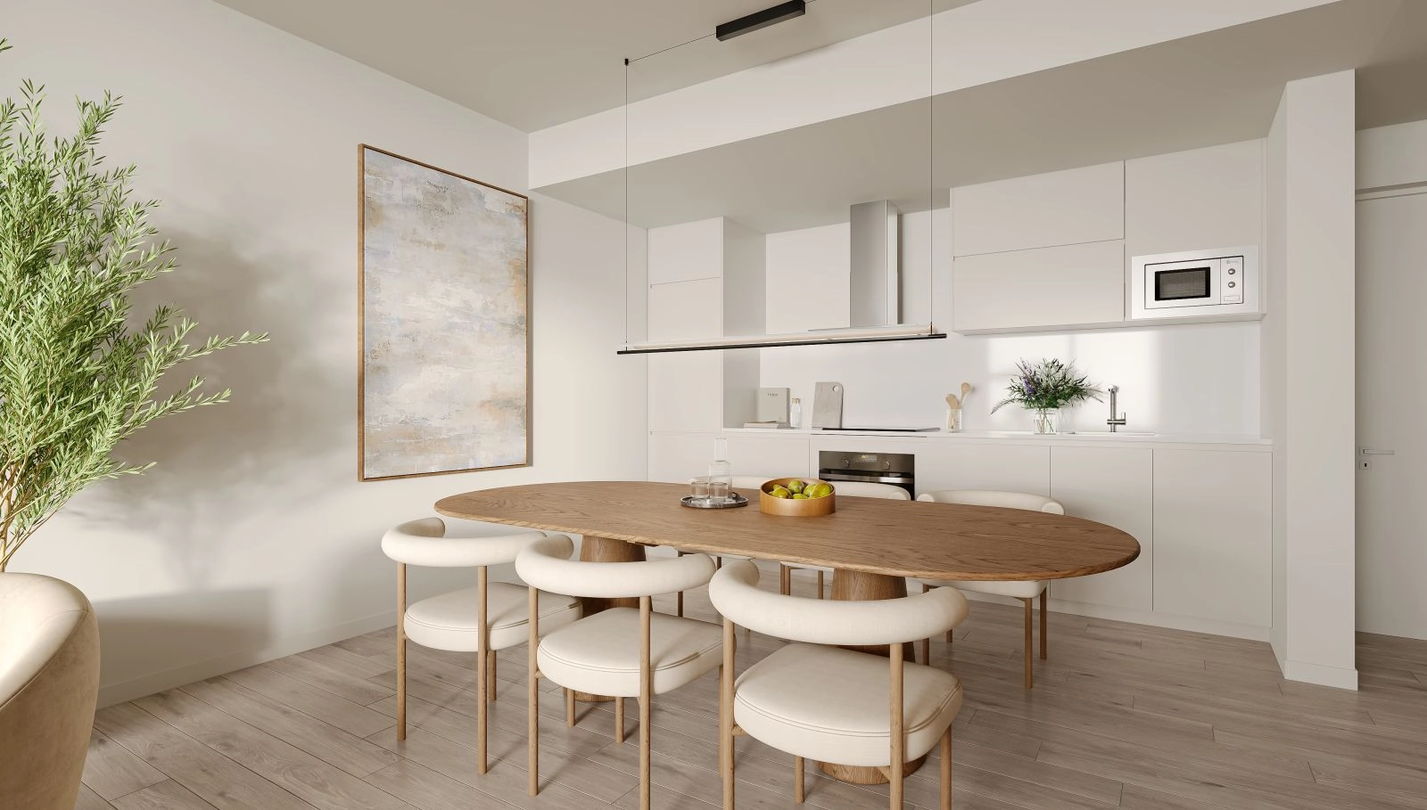 Una cocina moderna de concepto abierto, totalmente equipada con electrodomésticos de alta calidad, diseñada tanto por su funcionalidad como por su estilo.
