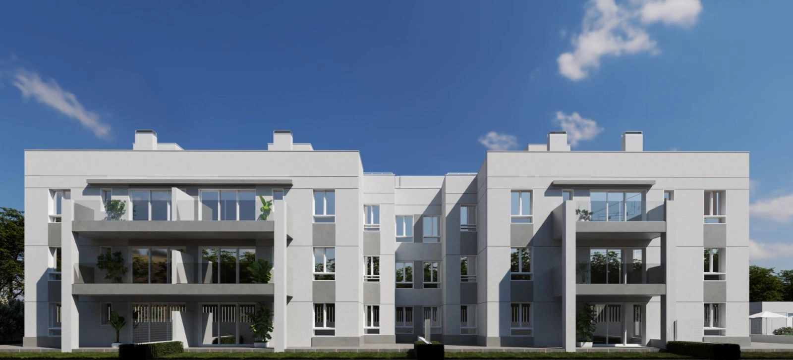 La arquitectura moderna del edificio se integra armoniosamente con el entorno verde.