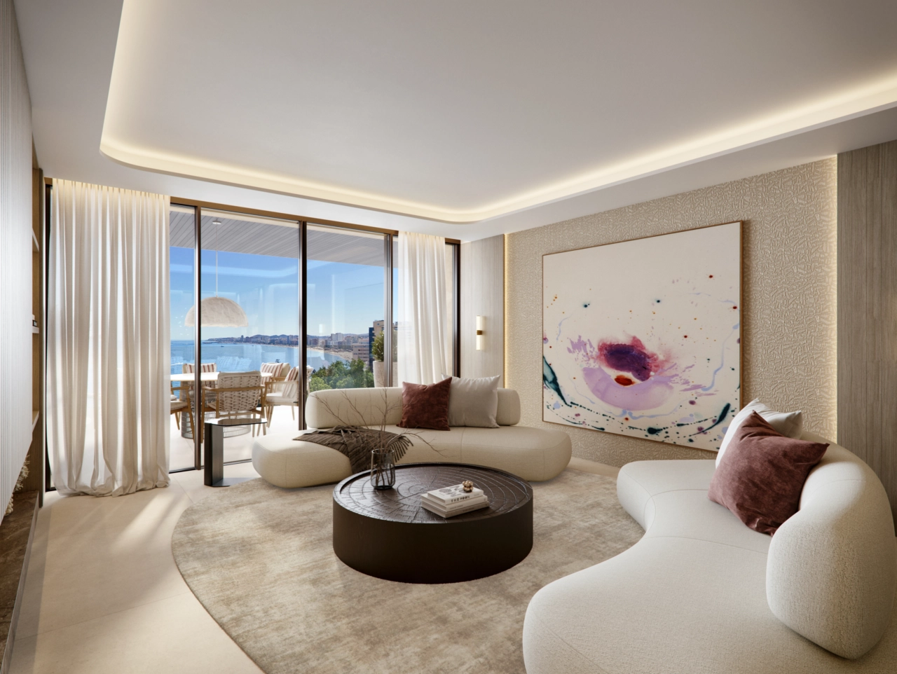 La zona de estar está diseñada para fluir sin problemas hacia la terraza, creando un estilo de vida luminoso y abierto que conecta interior y exterior.