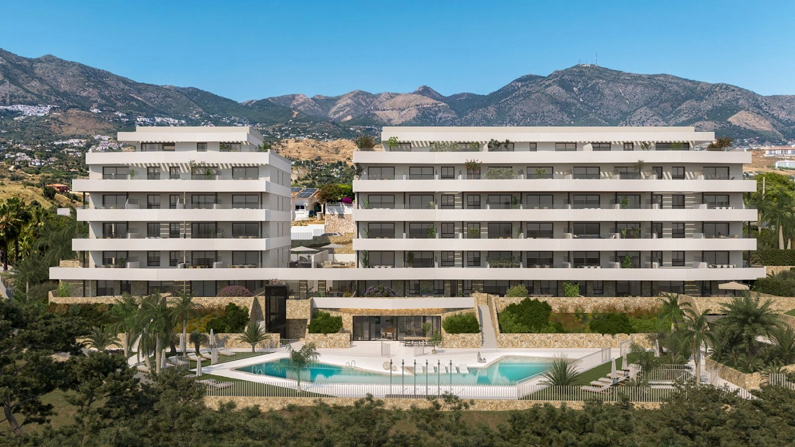 La elegante fachada moderna de la residencia, enmarcada por el espectacular paisaje de las montañas andaluzas.