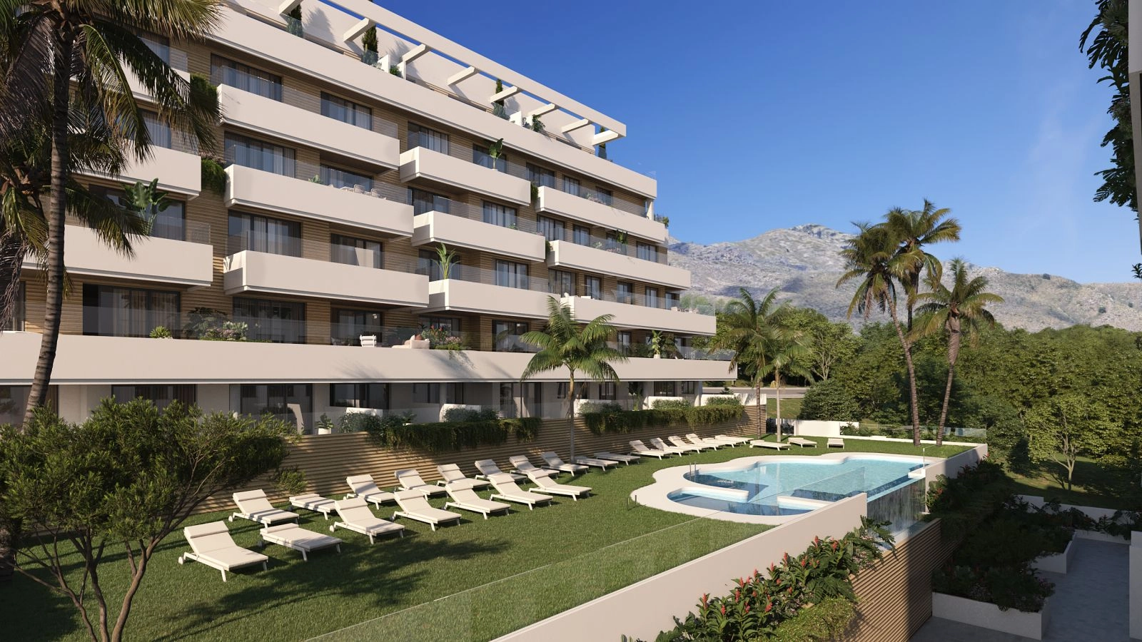 La atractiva piscina comunitaria y zona ajardinada, un espacio ideal para relajarse y disfrutar de las tardes soleadas.