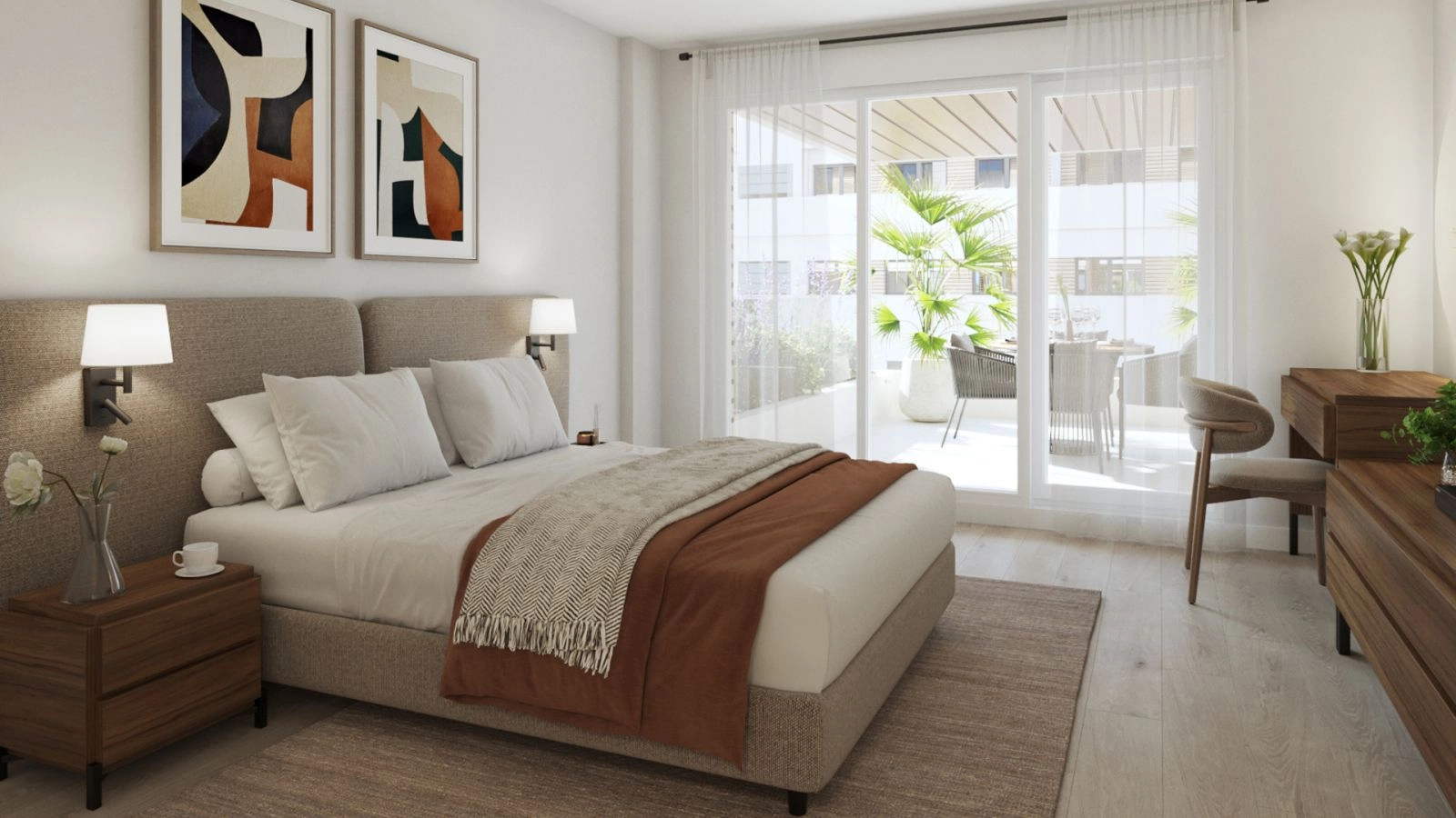 Un dormitorio principal sereno con acceso directo a una terraza privada, que fusiona el confort interior con la belleza exterior.