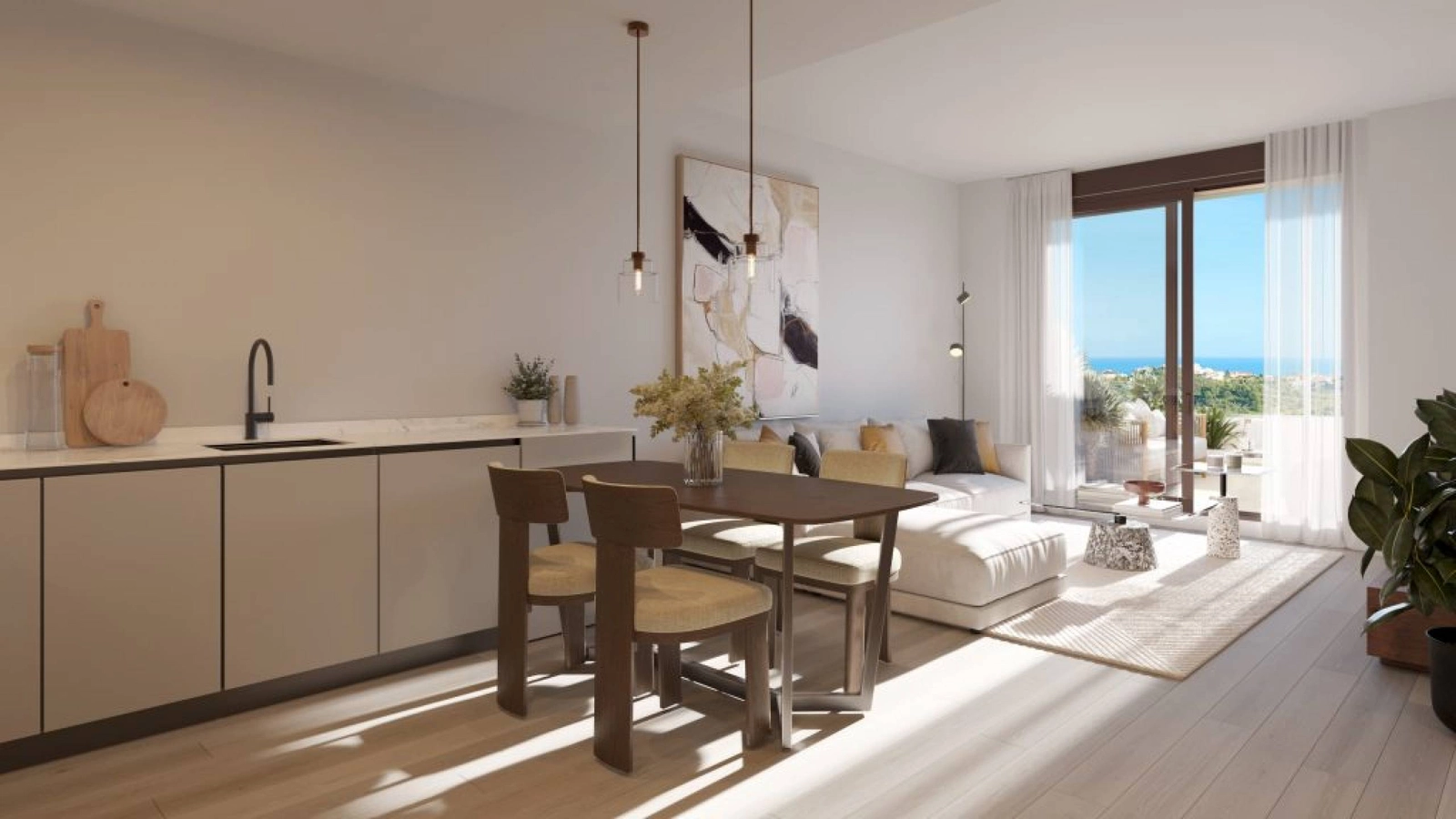 Una cocina de concepto abierto y zona de comedor, perfecta para recibir invitados o disfrutar de tranquilas comidas familiares.