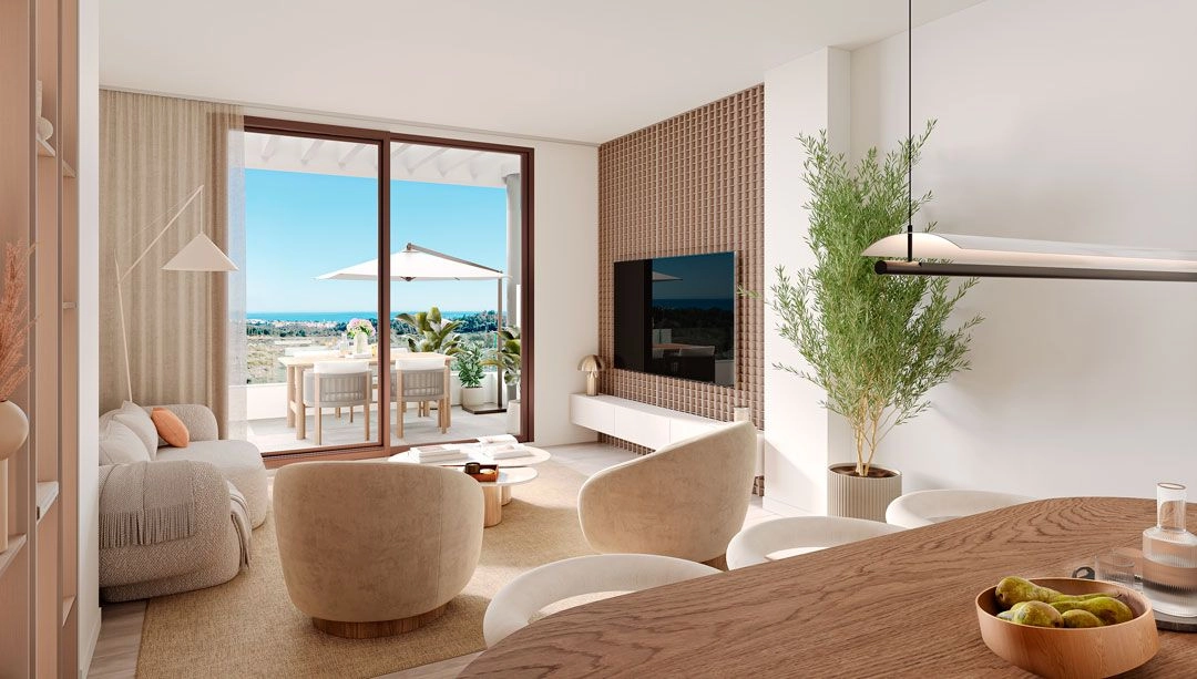 Una vida interior-exterior fluida, donde el elegante interior se extiende hacia una soleada terraza con hermosas vistas.