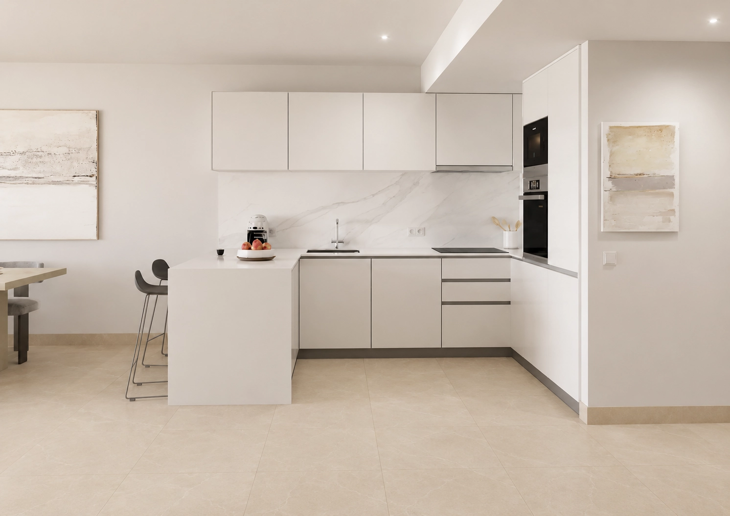 Una cocina moderna y totalmente equipada con electrodomésticos y acabados de alta calidad, diseñada tanto para la funcionalidad como para el estilo.