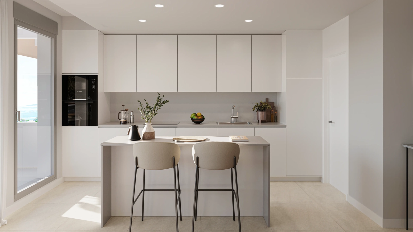 Cocina moderna con electrodomésticos de alta calidad y una práctica isla para comidas informales.