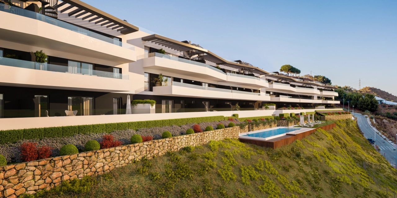 La elegante y moderna arquitectura de la promoción al atardecer.