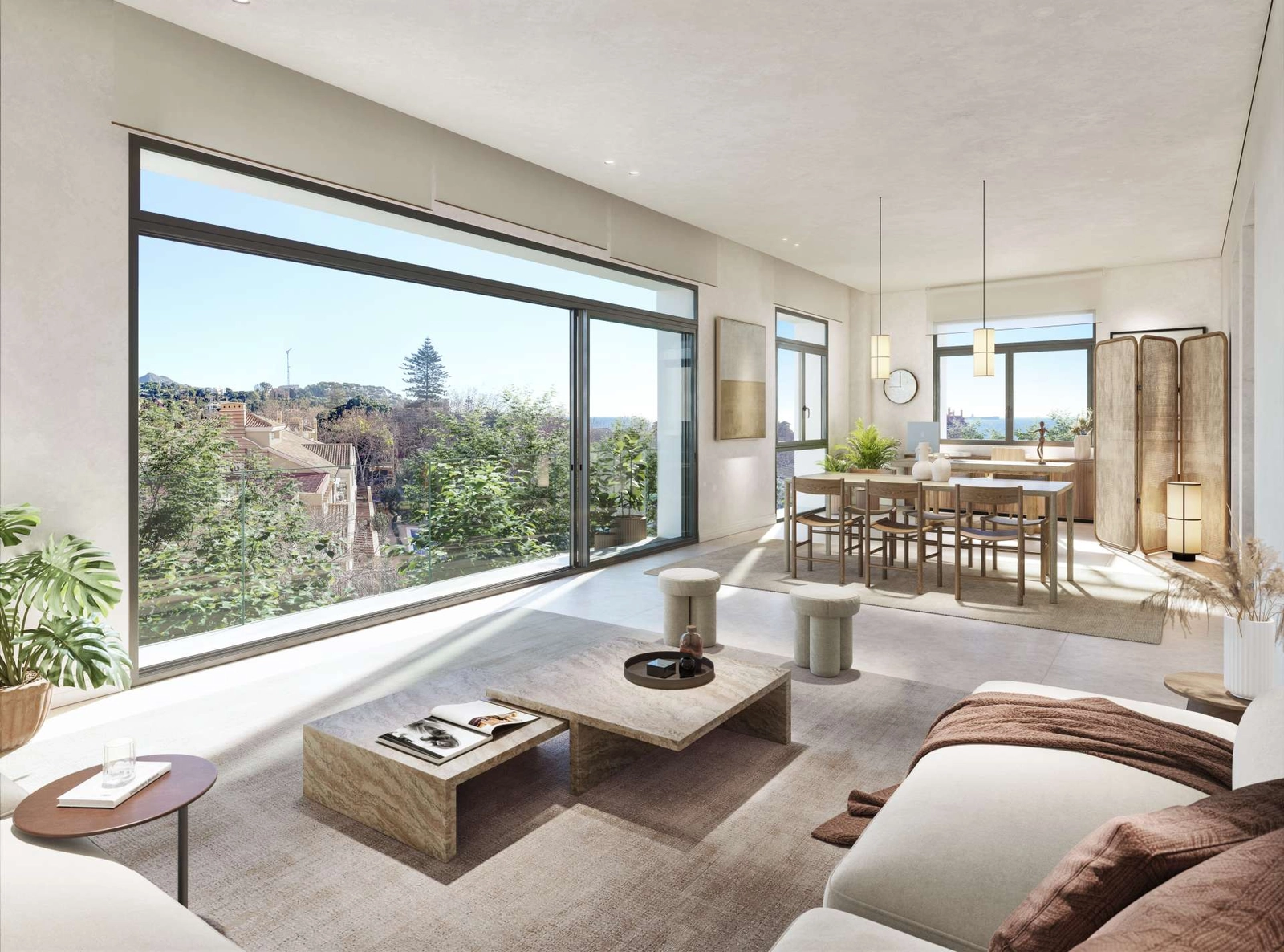 Grandes ventanales llenan los espacios habitables de luz natural y conectan los interiores con el bello entorno.