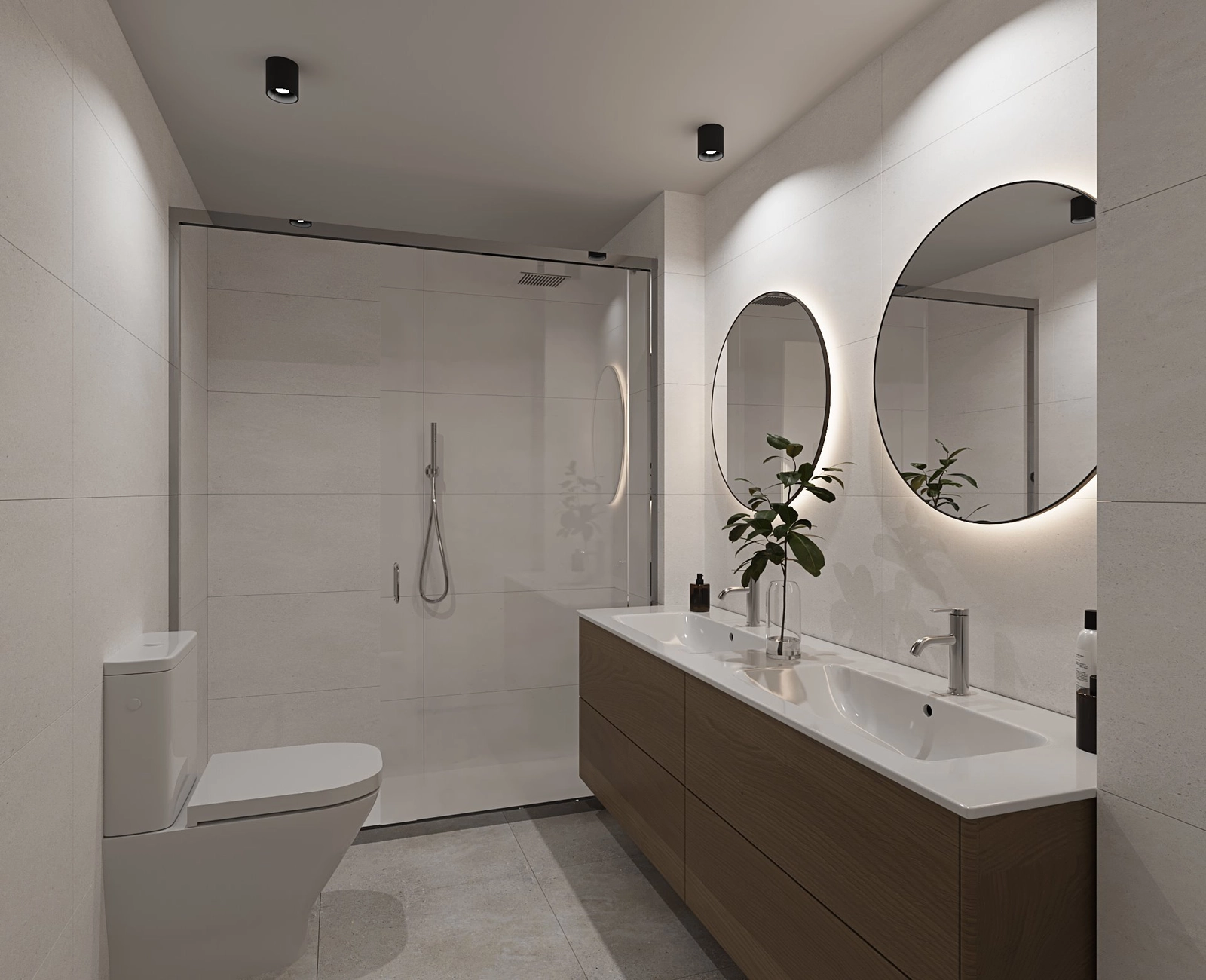 Un elegante baño principal con doble lavabo y accesorios contemporáneos de alta calidad.