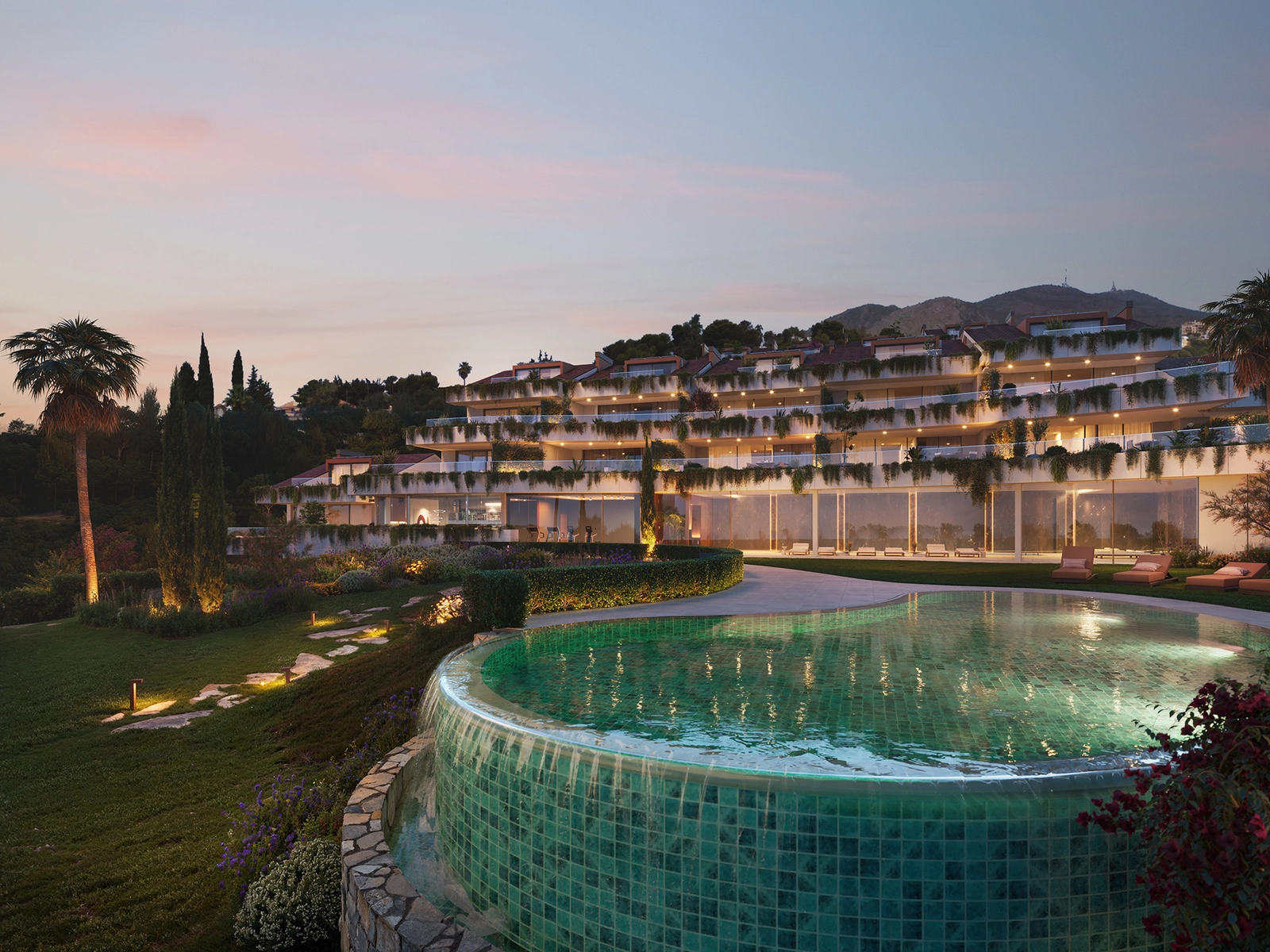 Al anochecer, las residencias se iluminan maravillosamente, creando un ambiente cálido y exclusivo.