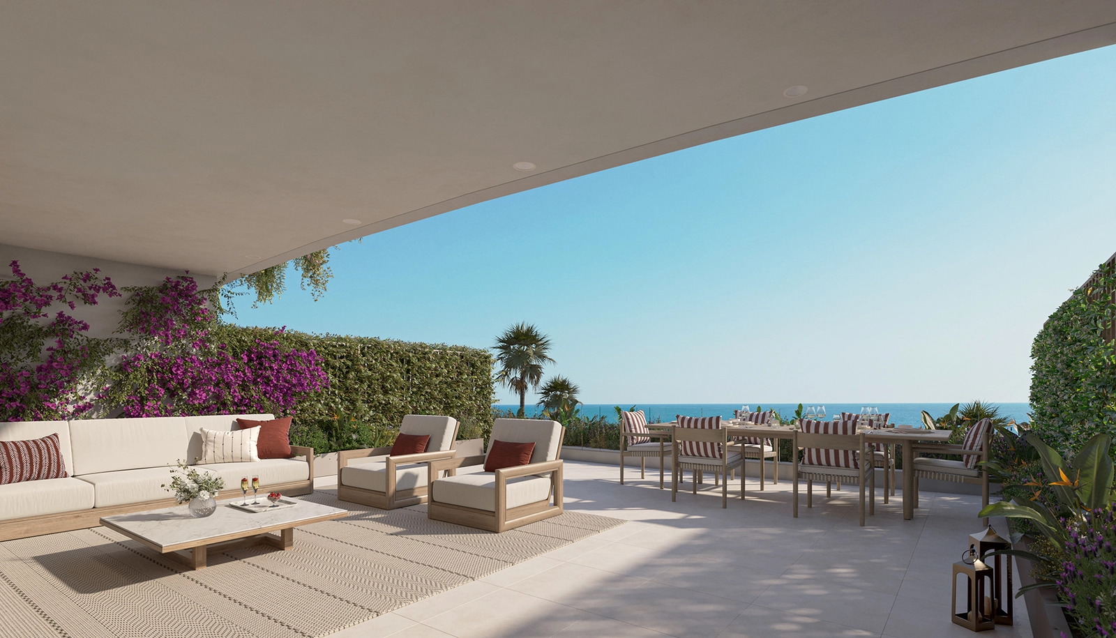 Disfrute de cenas al aire libre y relajación en su amplia terraza privada con vistas panorámicas al mar.