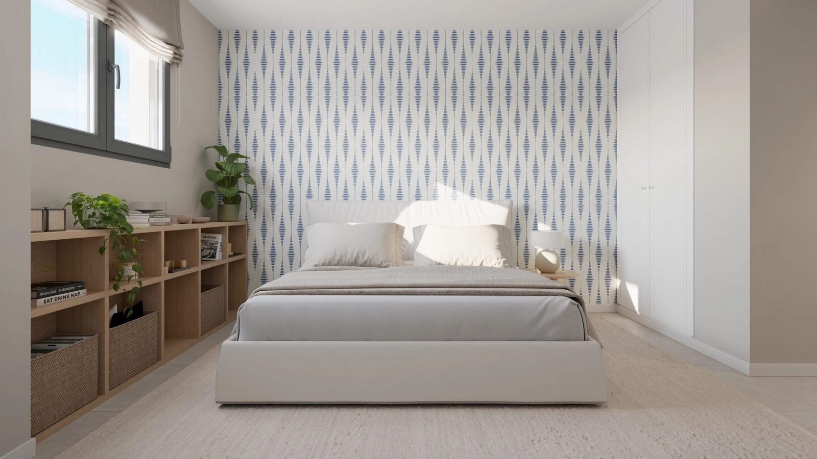 Un dormitorio de invitados cómodo y luminoso con amplio espacio y luz natural.