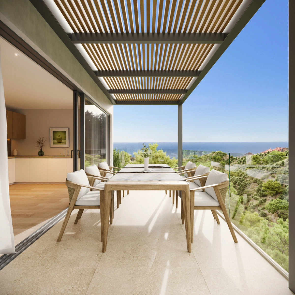Cene con familiares y amigos en su terraza privada mientras disfruta de las vistas al mar.