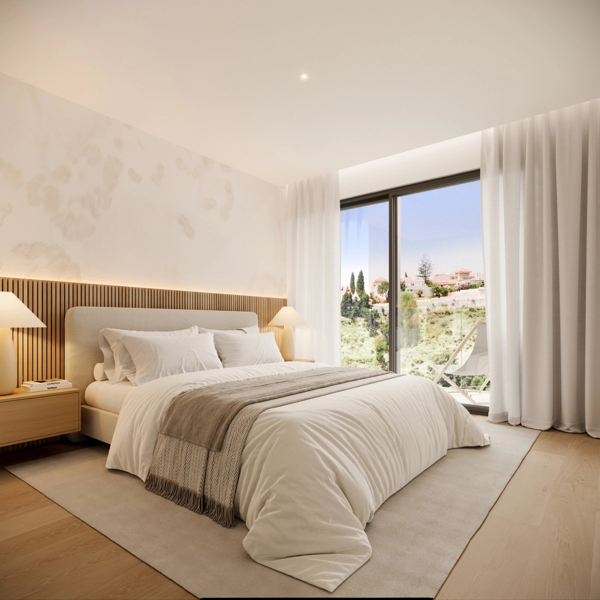 El dormitorio principal es un refugio de paz con grandes ventanales y vistas serenas.