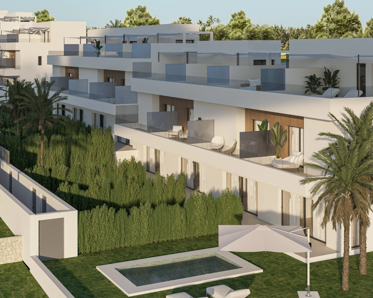 Una vista aérea de la urbanización, mostrando la arquitectura moderna y los jardines privados.
