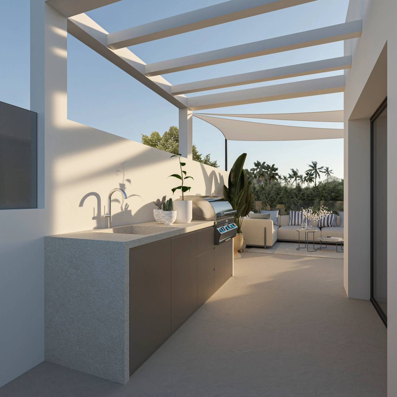 La terraza incluye una cocina exterior de alta calidad, perfecta para cenar al aire libre.