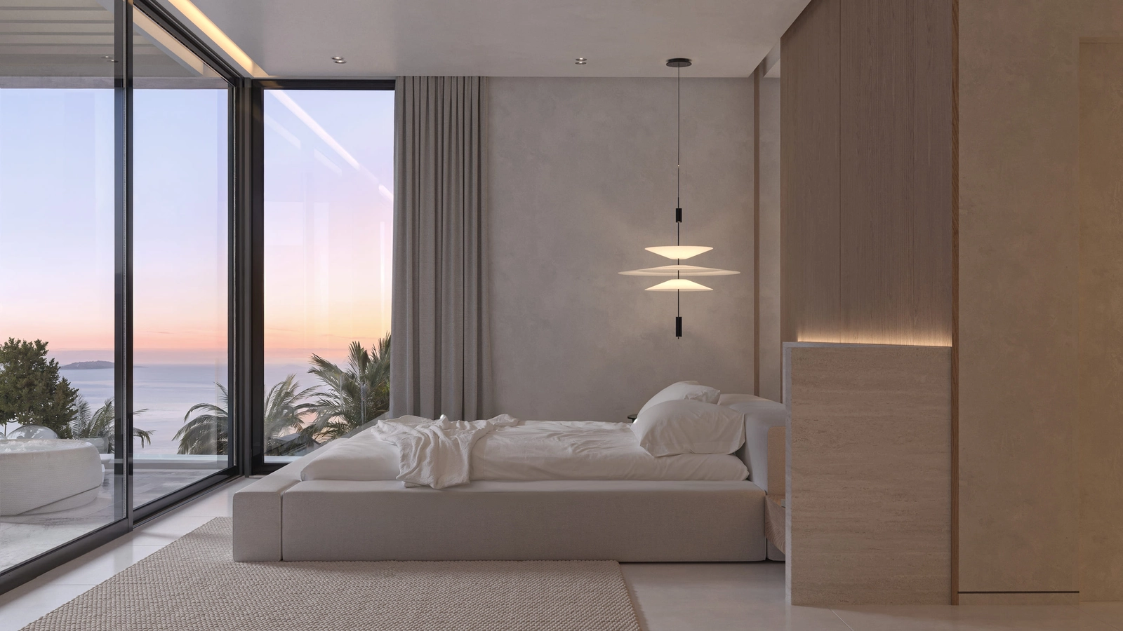 Un dormitorio sereno y elegante con acceso directo a una terraza privada a través de grandes puertas de cristal.