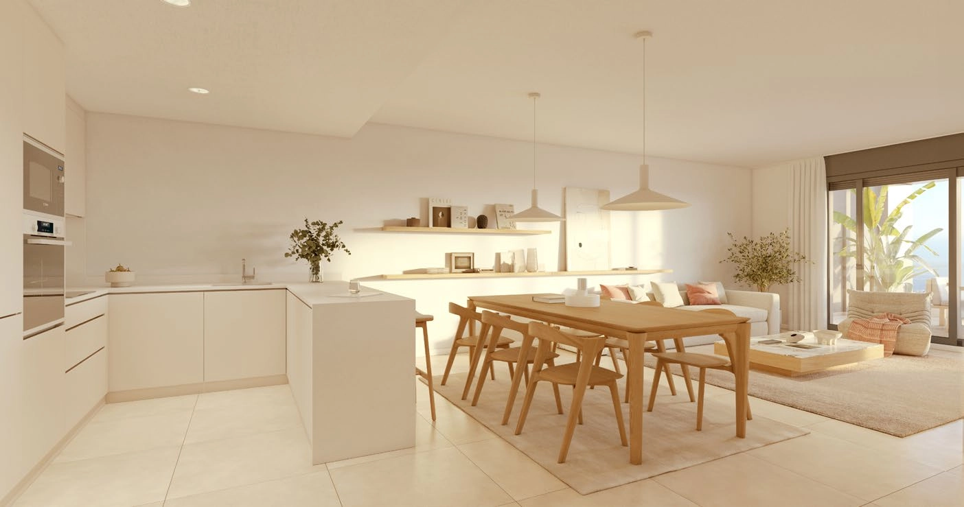 El corazón del hogar es el luminoso salón de planta abierta, perfecto para relajarse o recibir invitados.