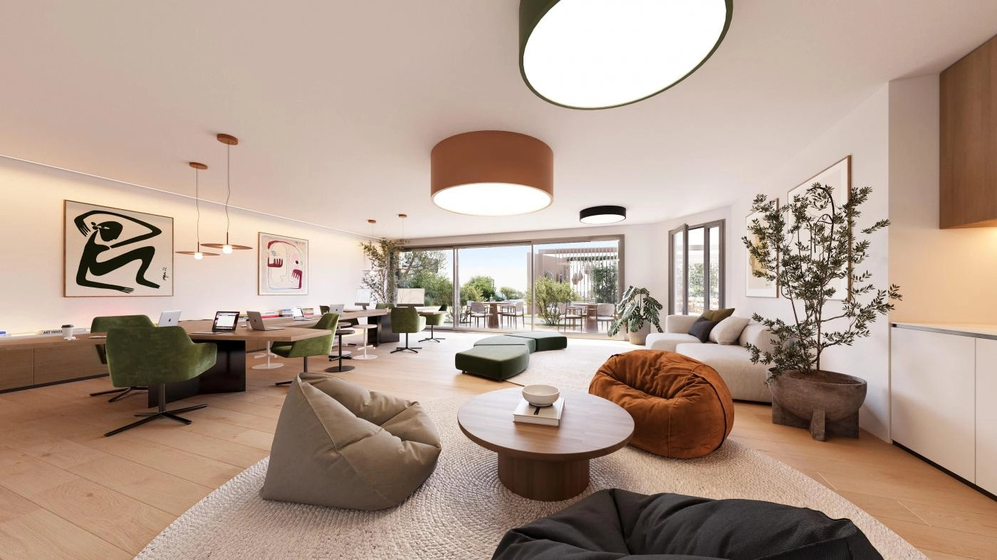 Un versátil y elegante salón social y de co-working donde los residentes pueden trabajar, reunirse o relajarse con comodidad.