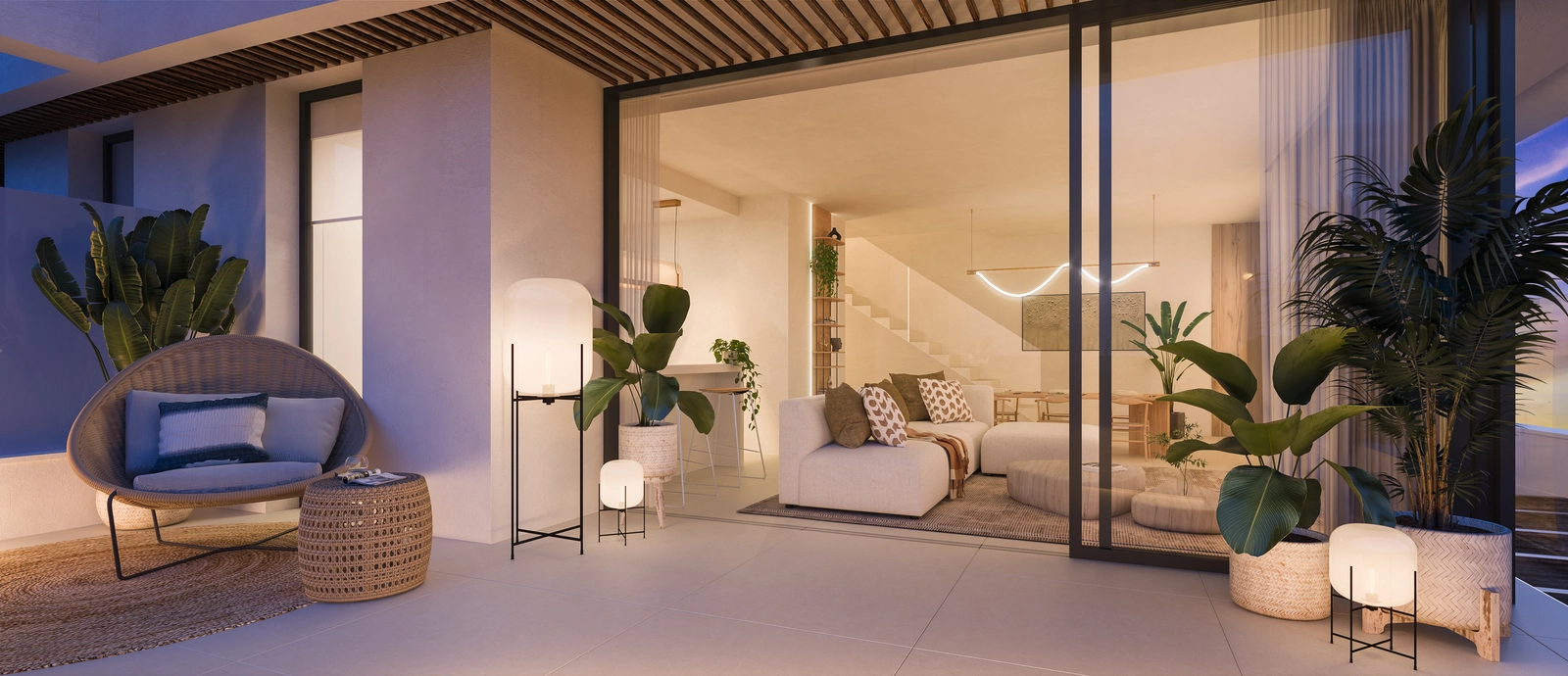 Un elegante salón que se abre a una espaciosa terraza para una vida fluida entre interior y exterior.