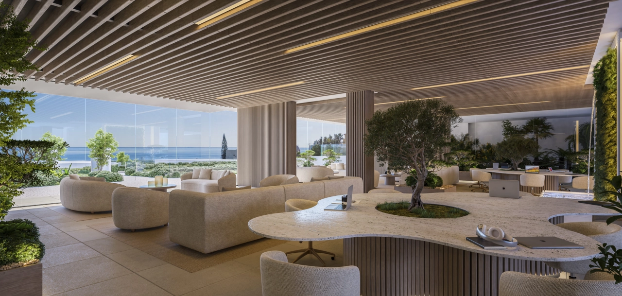 Un sofisticado salón para residentes y espacio de co-working, elegantemente diseñado para trabajar o relajarse.