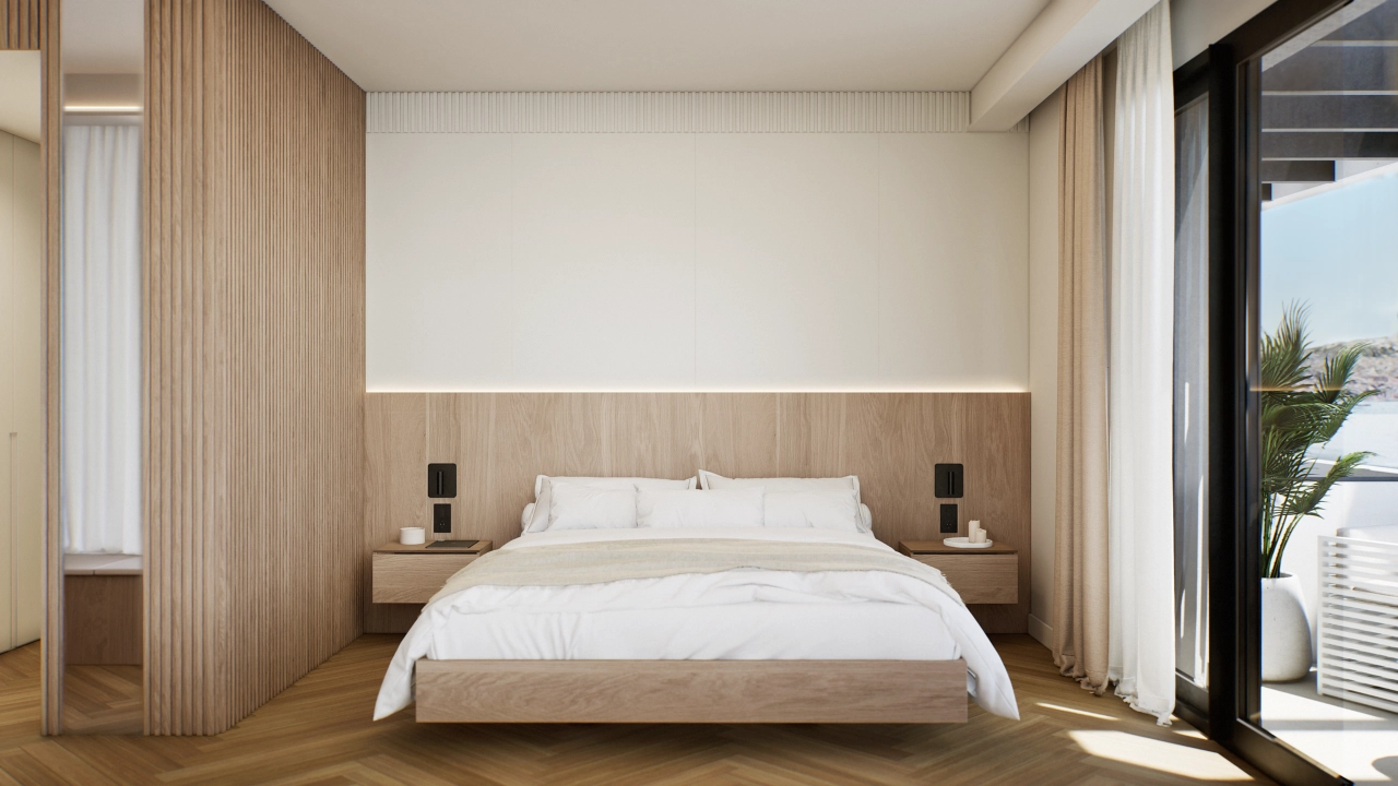 El sereno dormitorio principal es un refugio de paz con luz natural.