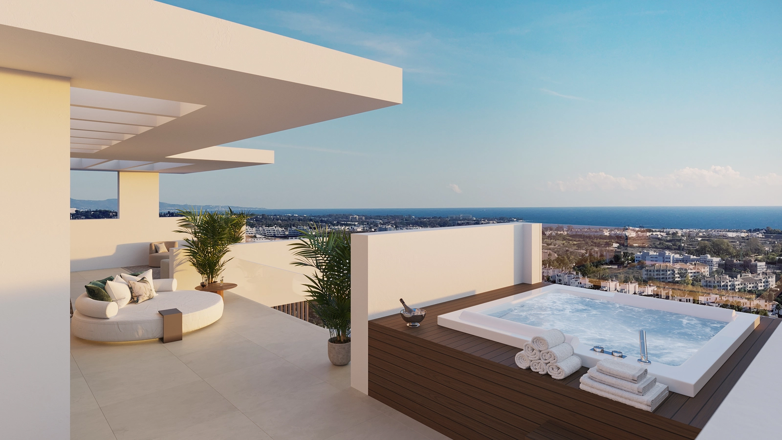 Una terraza privada en la azotea con jacuzzi ofrece el lugar perfecto para relajarse y contemplar el atardecer sobre la Costa del Sol.