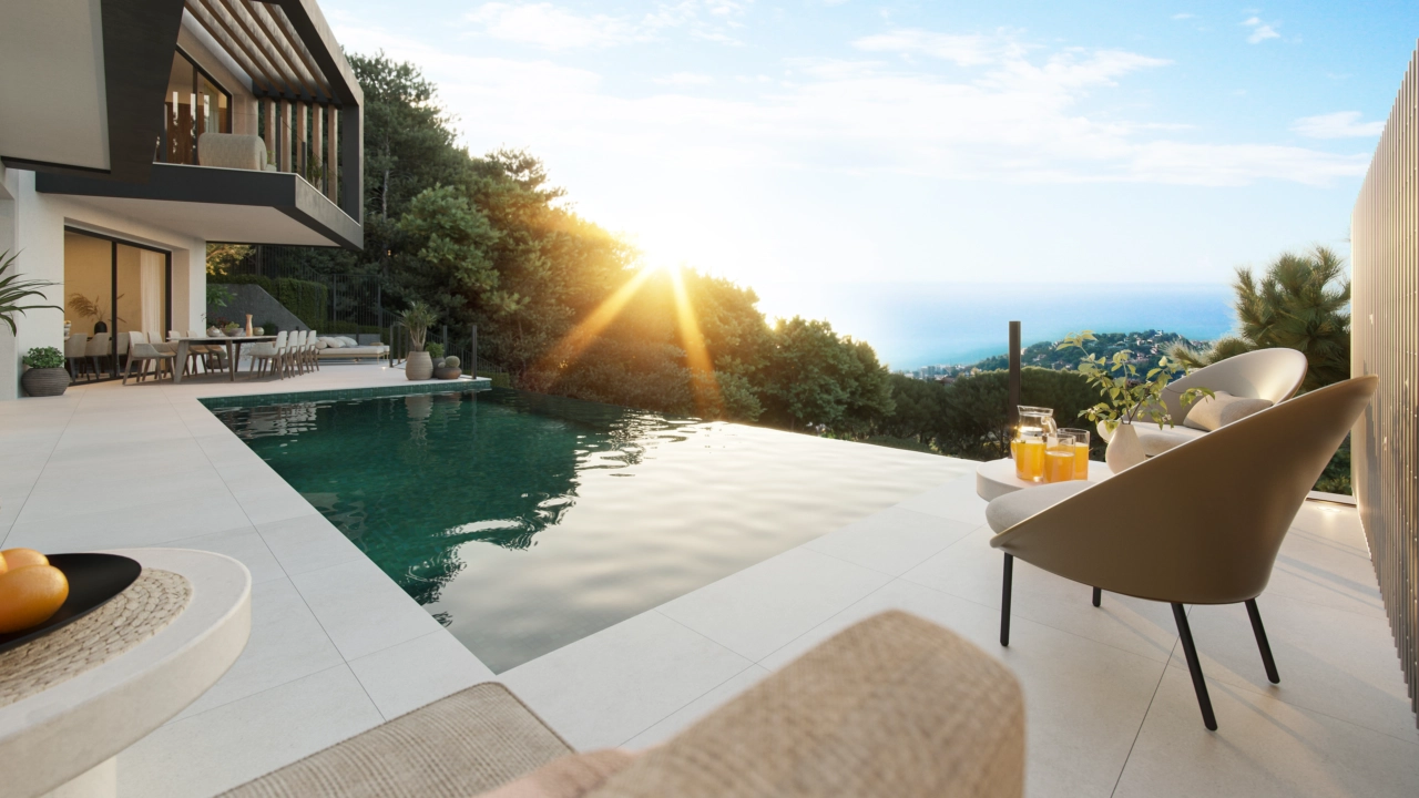 Relájese junto a la piscina y contemple la puesta de sol sobre las hermosas colinas de Málaga.