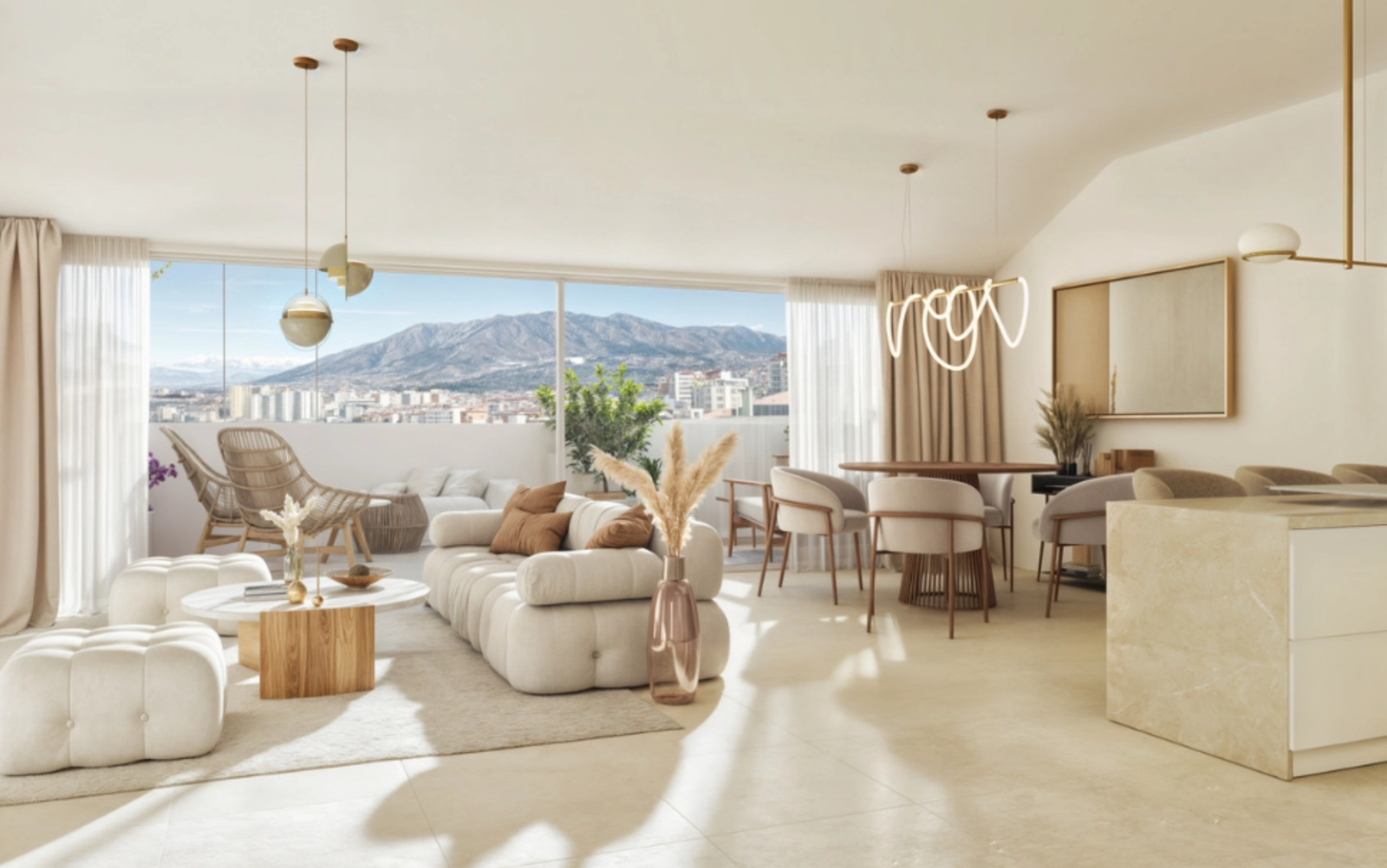 La zona de estar de planta abierta se conecta a la perfección con la terraza, aportando luz natural e impresionantes vistas.