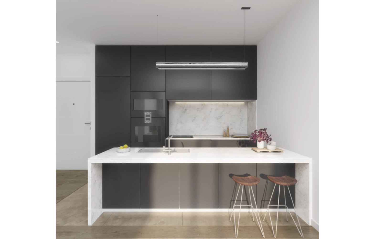 Una cocina moderna y totalmente equipada con una elegante isla, perfecta para cocinar y socializar.