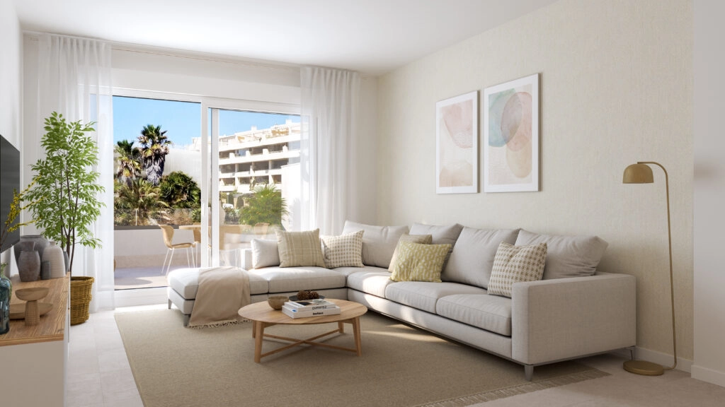 El luminoso y espacioso salón se conecta a la perfección con la terraza exterior, creando un espacio de vida interior-exterior ideal.