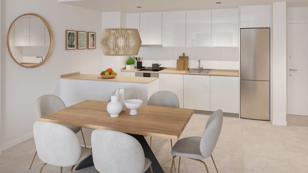 Una cocina moderna de concepto abierto, totalmente equipada con electrodomésticos de alta calidad, diseñada tanto para el día a día como para el ocio.