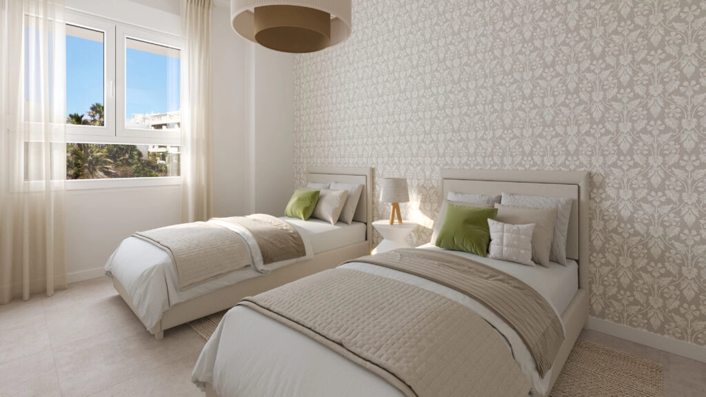 Un dormitorio de invitados cómodo y acogedor, cuidadosamente diseñado para el descanso y la relajación.